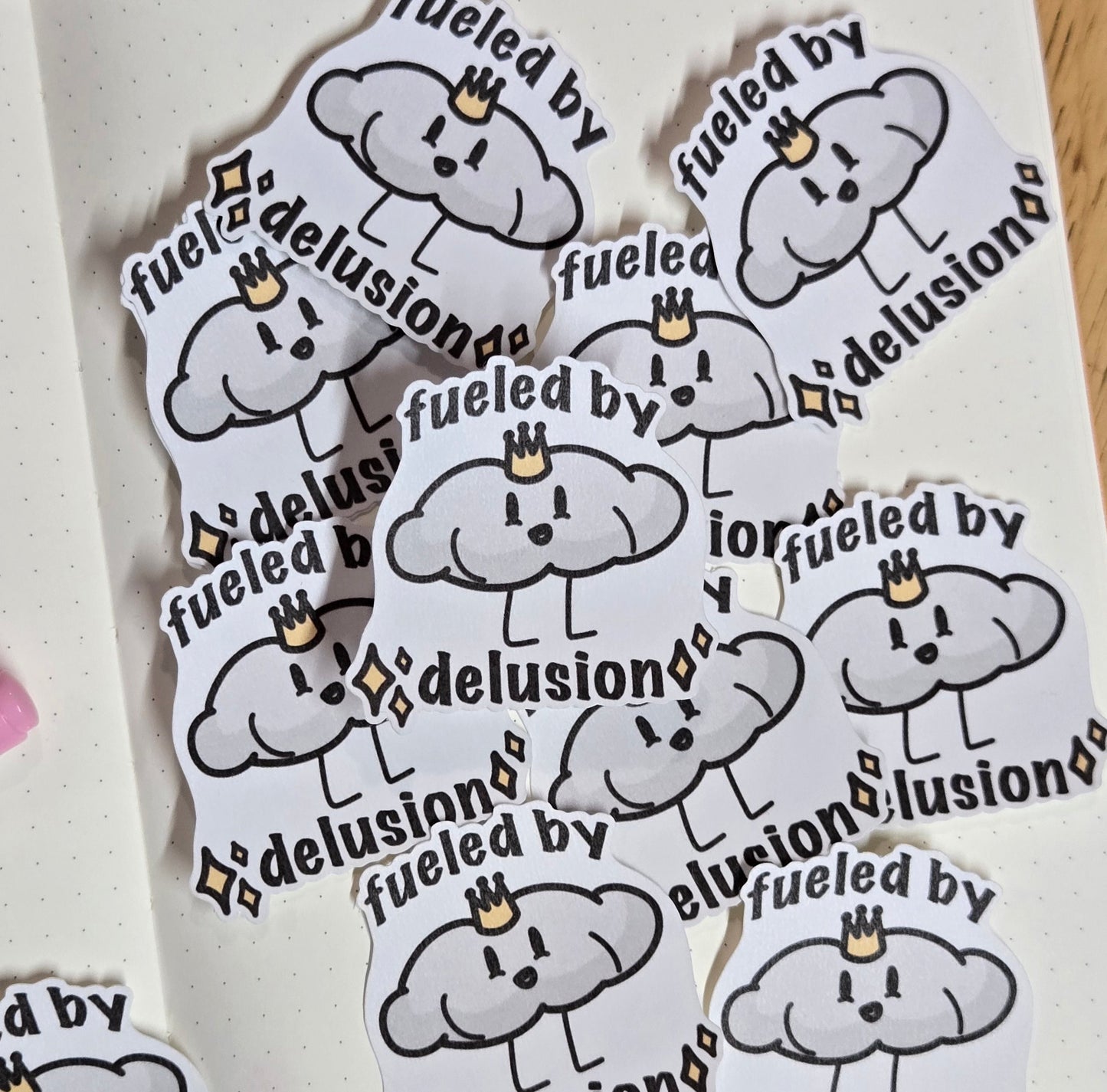 Fueled by Delusion Sticker